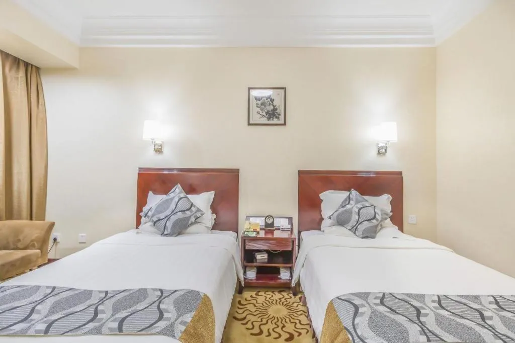 Bed in Jinjiang Hotel Qianan