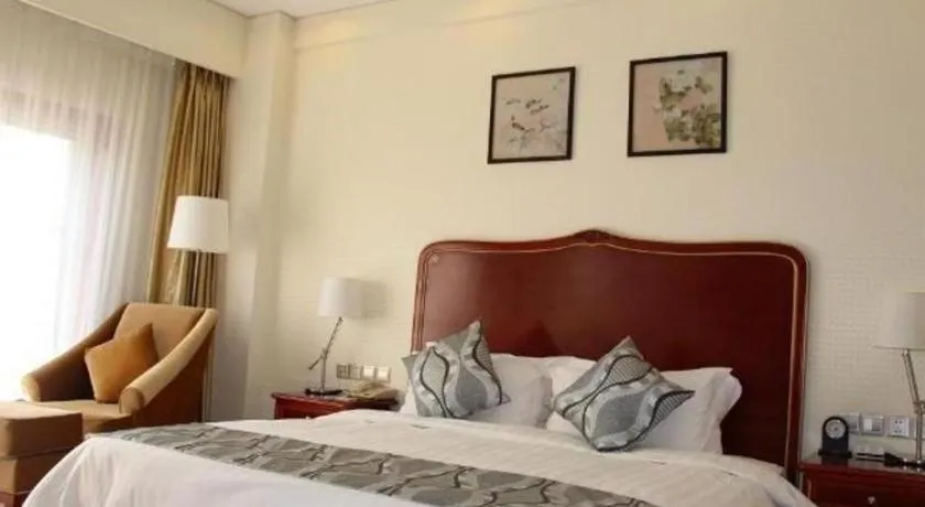 Bed in Jinjiang Hotel Qianan