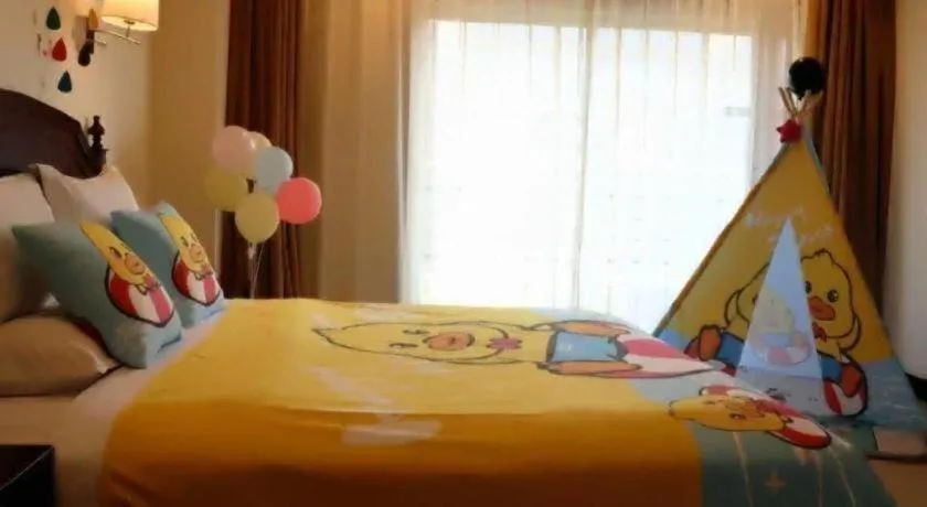 Bed in Jinjiang Hotel Qianan