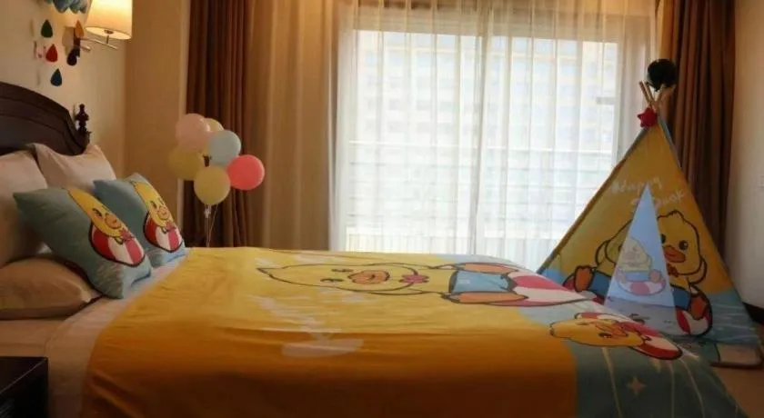 Bed in Jinjiang Hotel Qianan