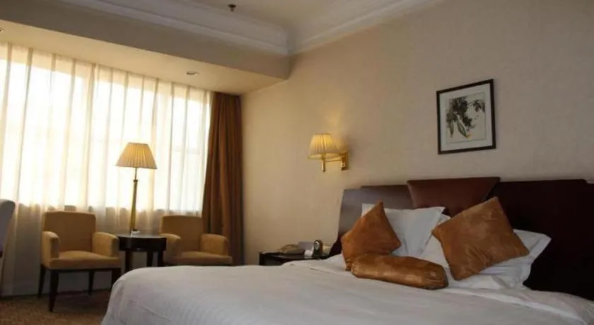 Bed in Jinjiang Hotel Qianan