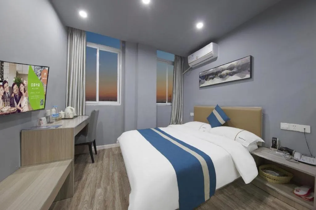 Bed in Shell Hotel Taixing Huangqiao Town Dinghui Road