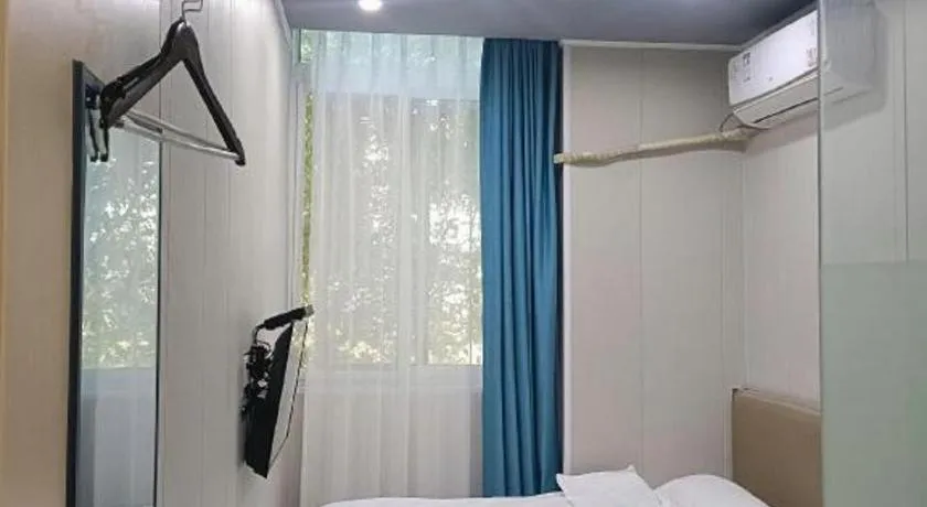 Bed in Shell Hotel Taixing Huangqiao Town Dinghui Road