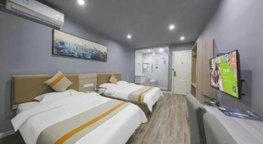 Bed in Shell Hotel Taixing Huangqiao Town Dinghui Road