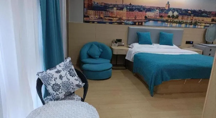 Bed in Shell Hotel Taixing Huangqiao Town Dinghui Road