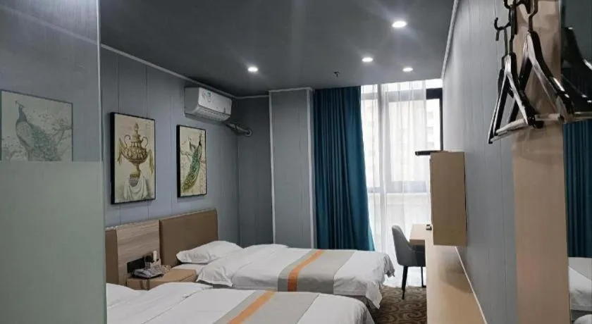 Bed in Shell Hotel Taixing Huangqiao Town Dinghui Road