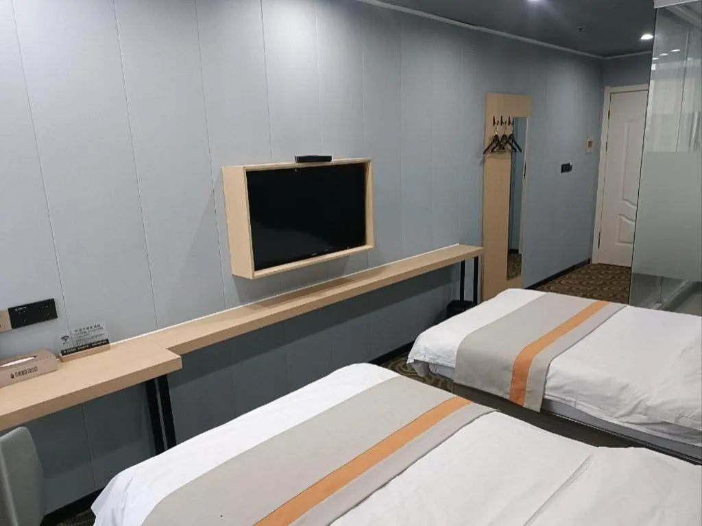 Bed in Shell Hotel Taixing Huangqiao Town Dinghui Road