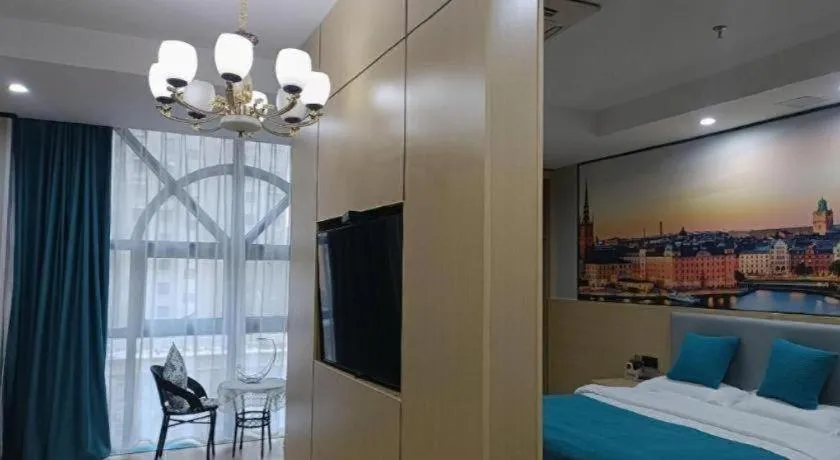 Bed in Shell Hotel Taixing Huangqiao Town Dinghui Road