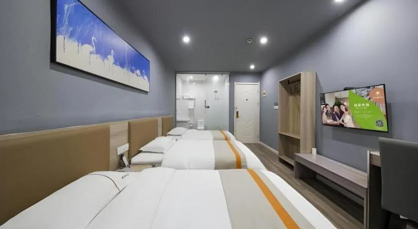 Bed in Shell Hotel Taixing Huangqiao Town Dinghui Road