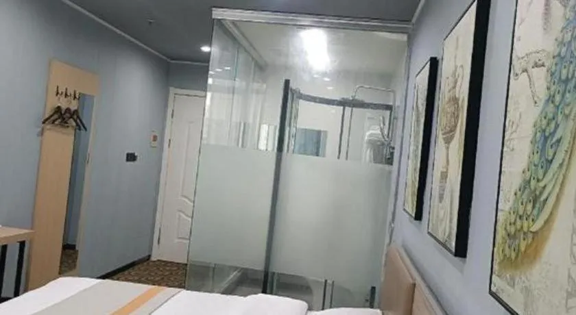 Bed in Shell Hotel Taixing Huangqiao Town Dinghui Road