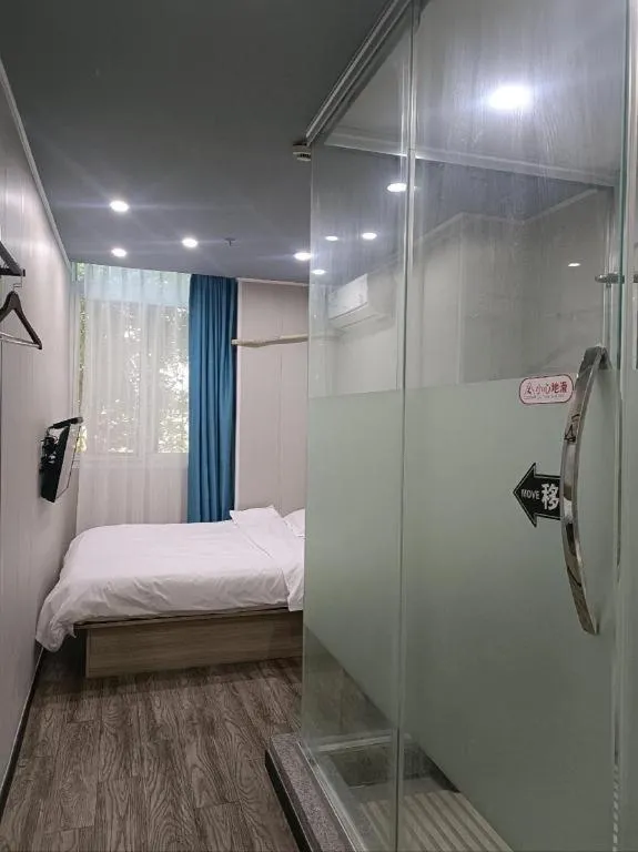Bed in Shell Hotel Taixing Huangqiao Town Dinghui Road