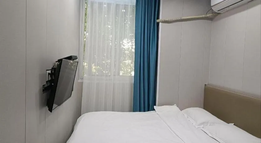 Bed in Shell Hotel Taixing Huangqiao Town Dinghui Road