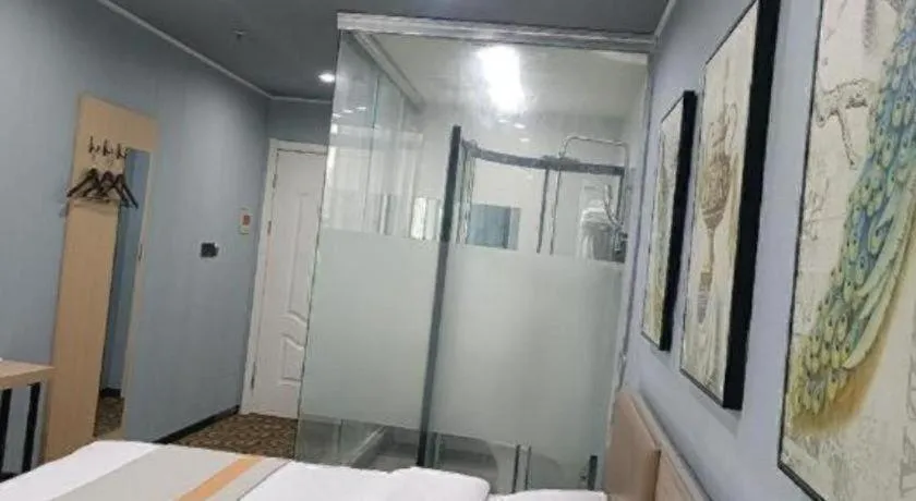 Bed in Shell Hotel Taixing Huangqiao Town Dinghui Road