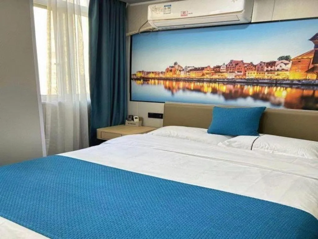 Bed in Shell Hotel Taixing Huangqiao Town Dinghui Road