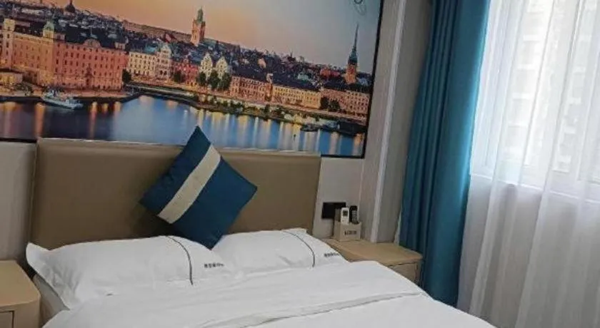 Bed in Shell Hotel Taixing Huangqiao Town Dinghui Road