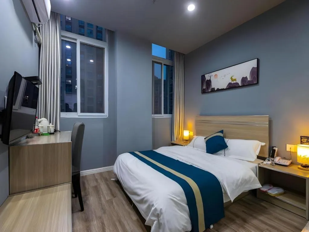 Bed in Shell Hotel Taixing Huangqiao Town Dinghui Road