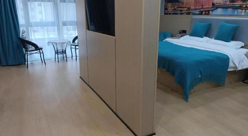 Bed in Shell Hotel Taixing Huangqiao Town Dinghui Road