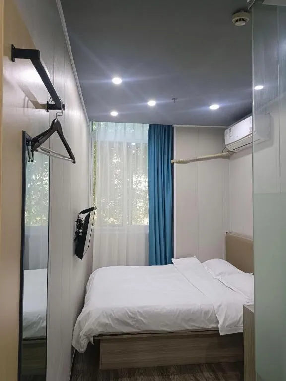 Bed in Shell Hotel Taixing Huangqiao Town Dinghui Road