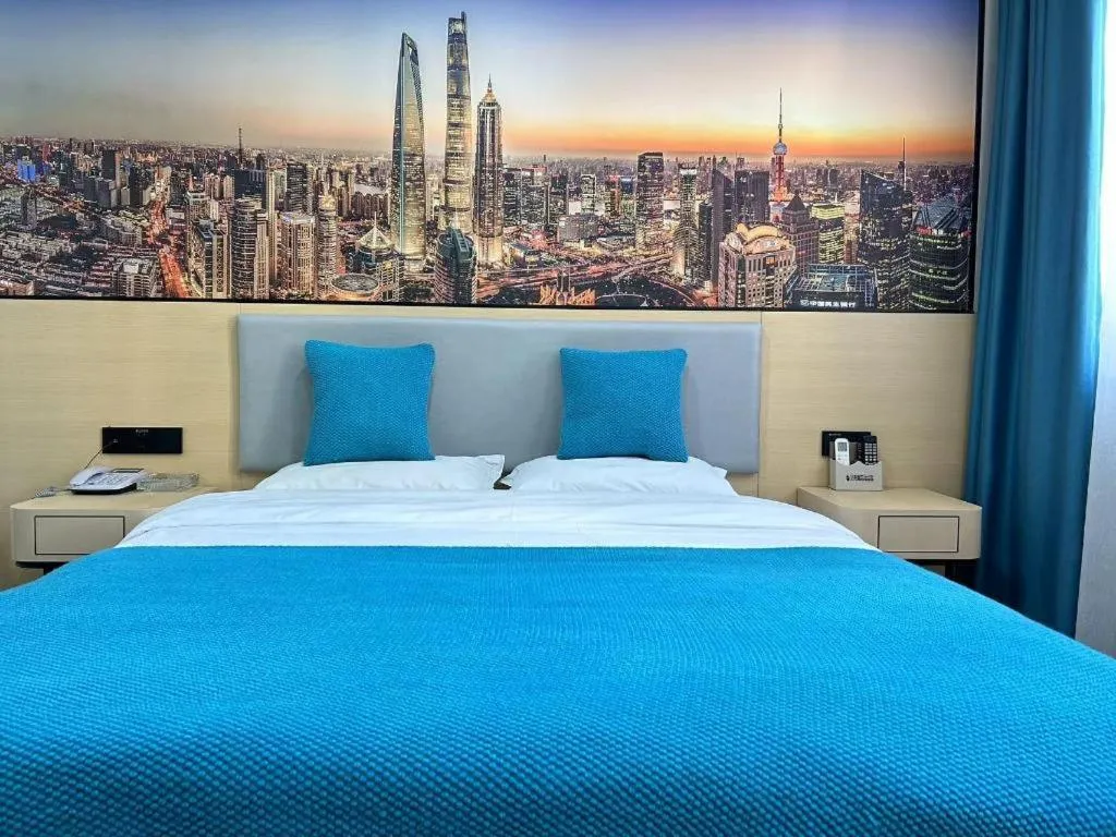 Bed in Shell Hotel Taixing Huangqiao Town Dinghui Road