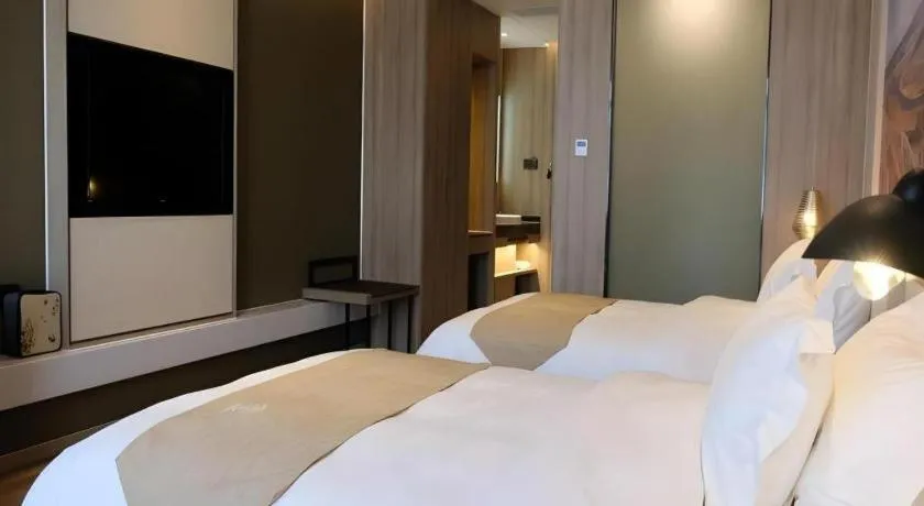 Bed in GreenTree Eastern Hotel Bengbu Huaishang District Yubo Garden