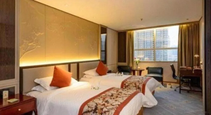 Bed in Dahe Jinjiang Hotel