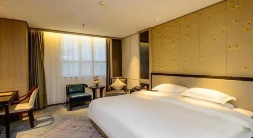 Bed in Dahe Jinjiang Hotel