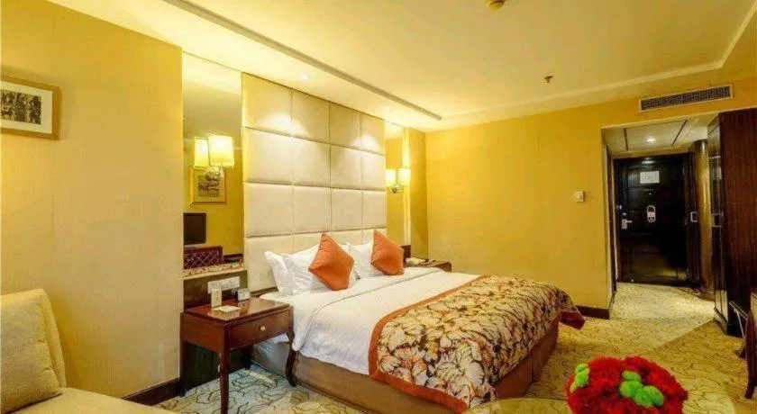 Bed in Dahe Jinjiang Hotel