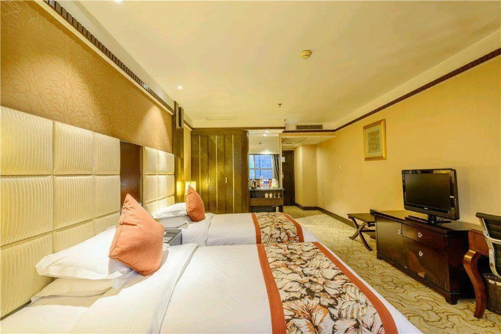 Bed in Dahe Jinjiang Hotel