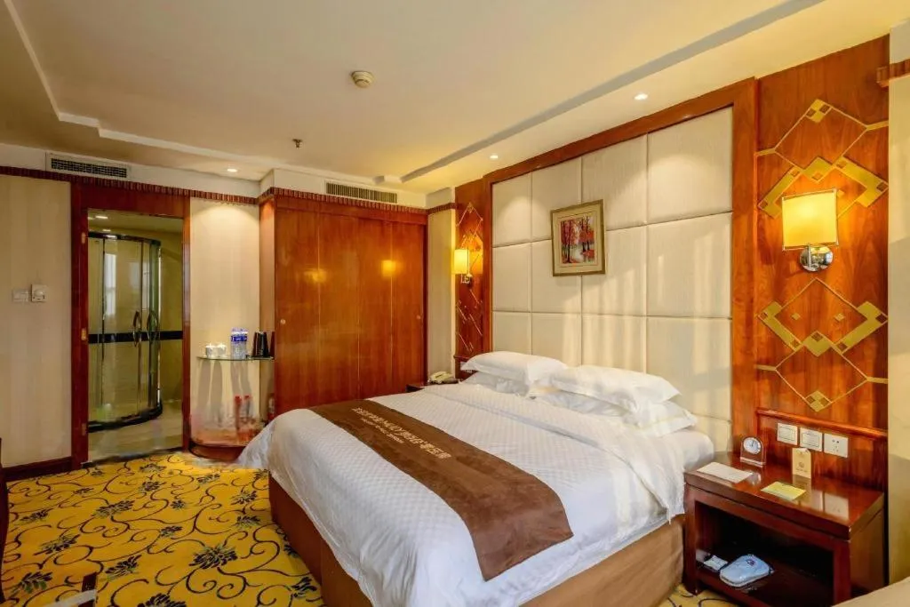 Bed in Dahe Jinjiang Hotel