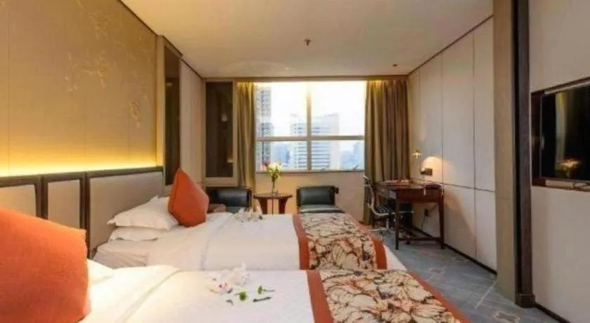 Bed in Dahe Jinjiang Hotel