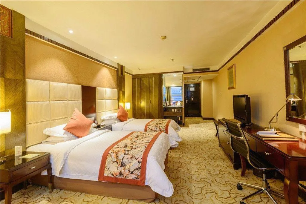 Bed in Dahe Jinjiang Hotel