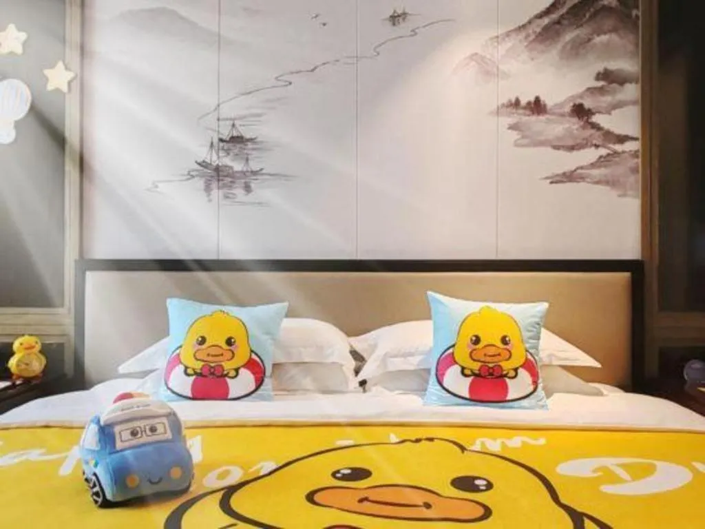 Bed in Dahe Jinjiang Hotel