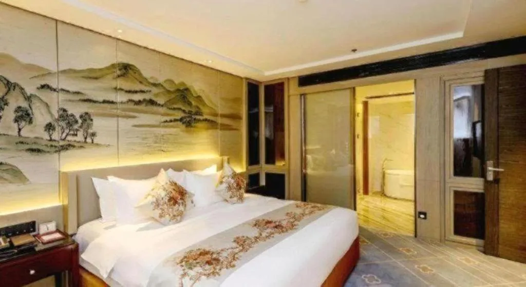 Bed in Dahe Jinjiang Hotel