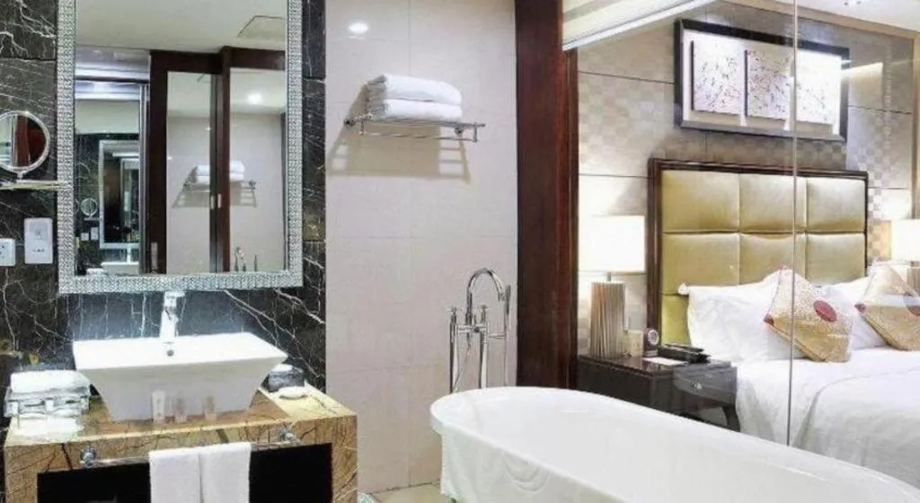 Bed in Dahe Jinjiang Hotel