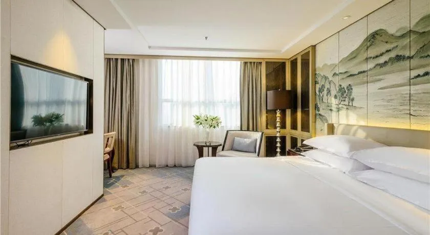 Bed in Dahe Jinjiang Hotel