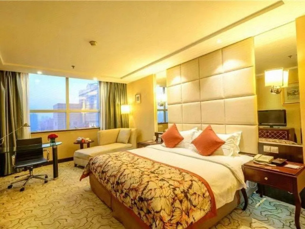 Bed in Dahe Jinjiang Hotel