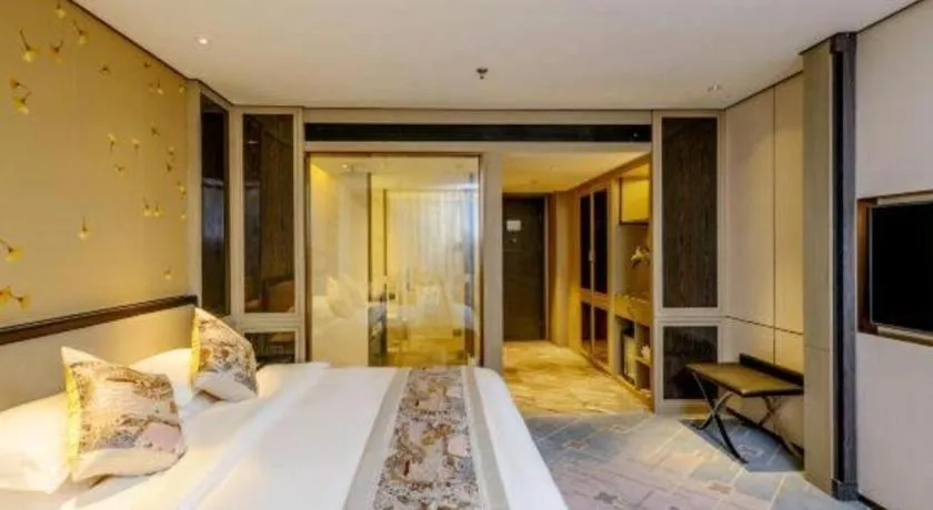 Bed in Dahe Jinjiang Hotel