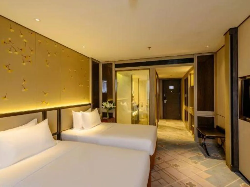 Bed in Dahe Jinjiang Hotel