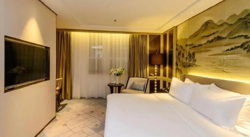 Bed in Dahe Jinjiang Hotel