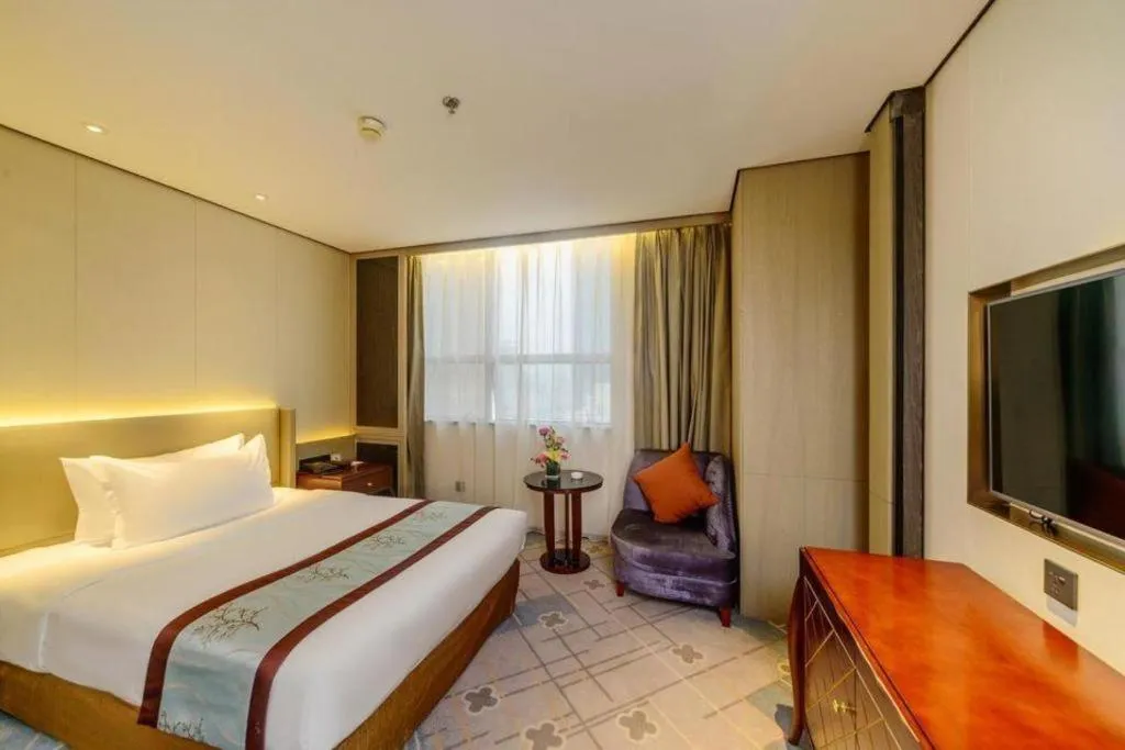 Bed in Dahe Jinjiang Hotel