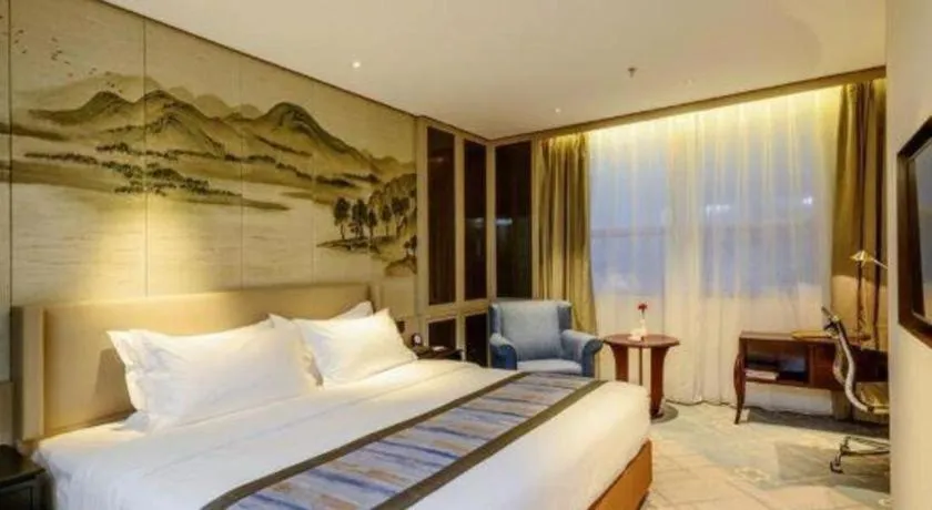 Bed in Dahe Jinjiang Hotel