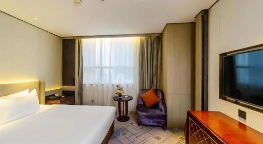 Bed in Dahe Jinjiang Hotel