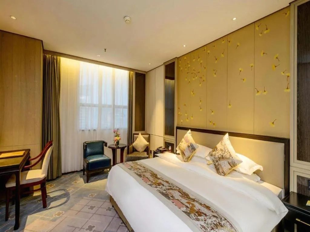 Bed in Dahe Jinjiang Hotel