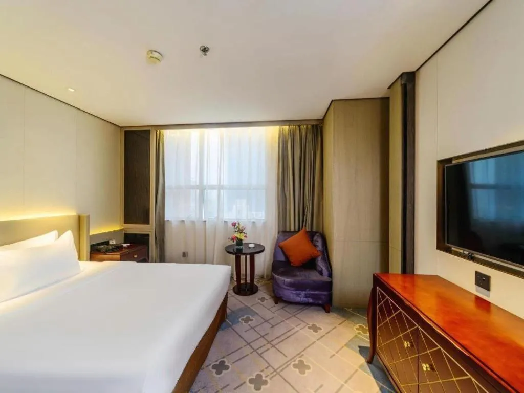 Bed in Dahe Jinjiang Hotel