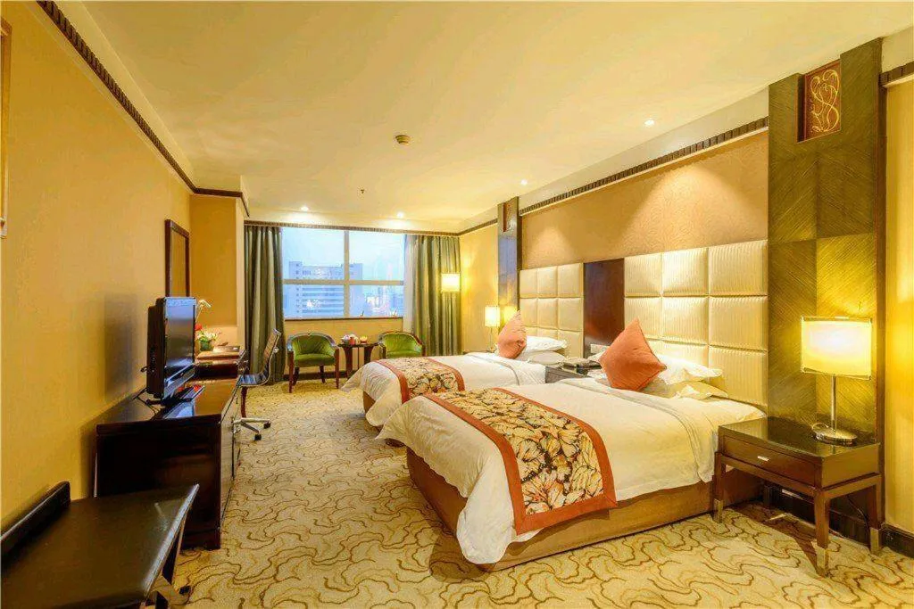 Bed in Dahe Jinjiang Hotel