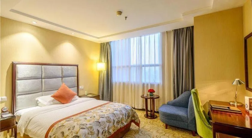 Bed in Dahe Jinjiang Hotel