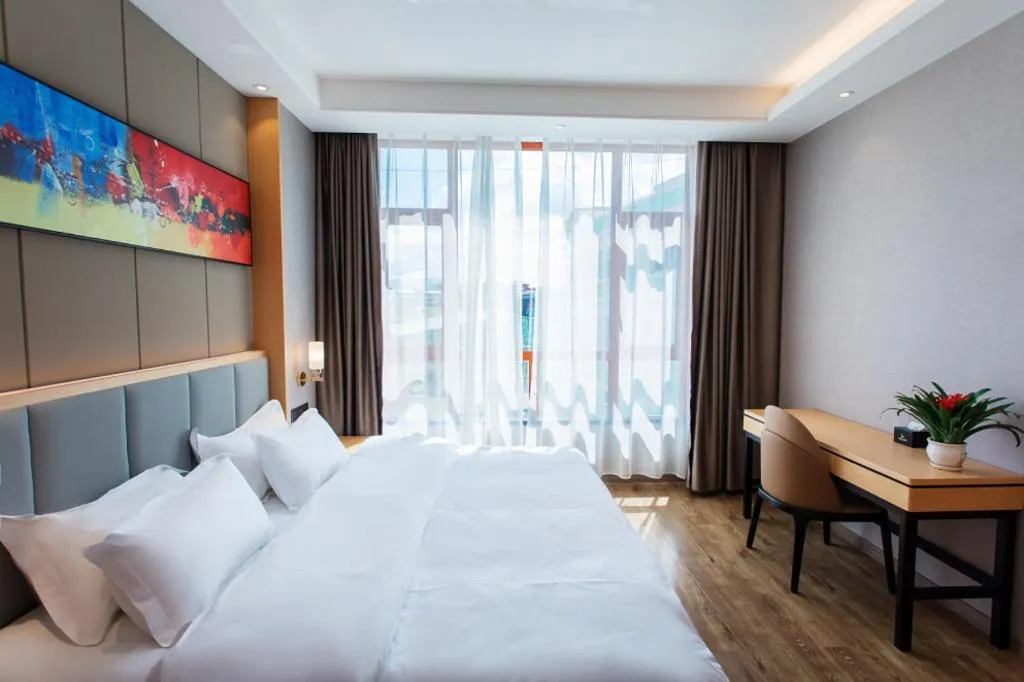 Bed in GreenTree Eastern Hotel Yunnan Shangri-La Yangtang Road