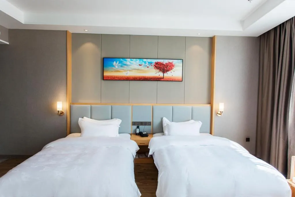 Bed in GreenTree Eastern Hotel Yunnan Shangri-La Yangtang Road