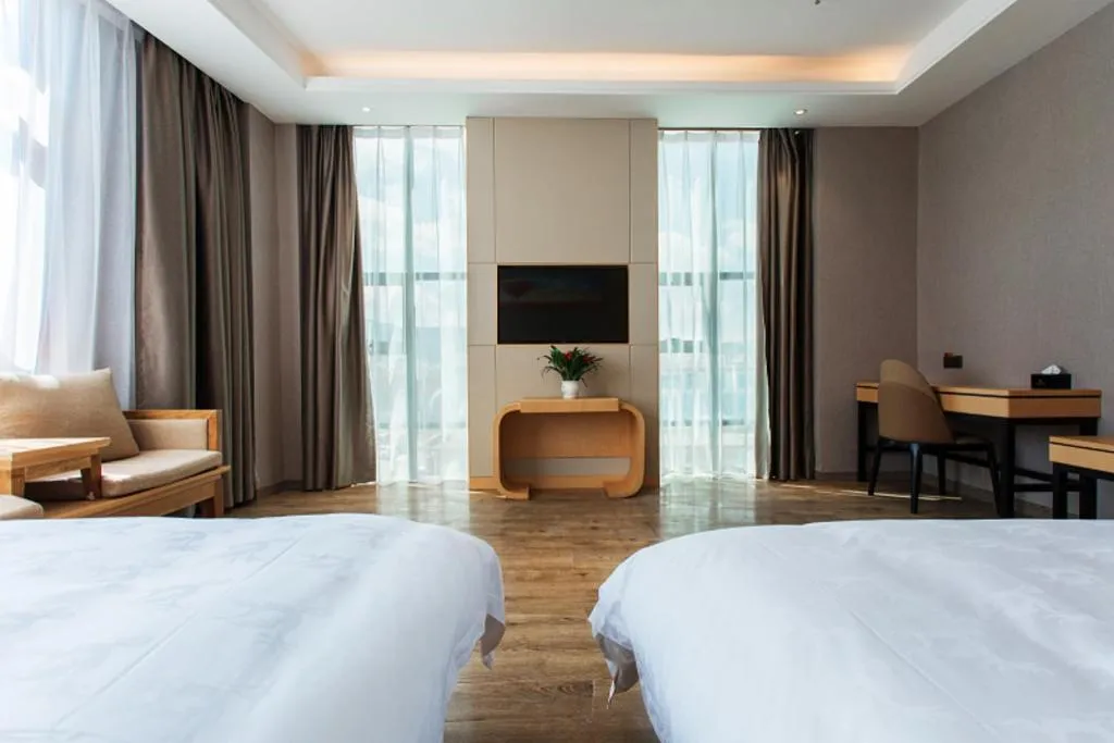 Bed in GreenTree Eastern Hotel Yunnan Shangri-La Yangtang Road