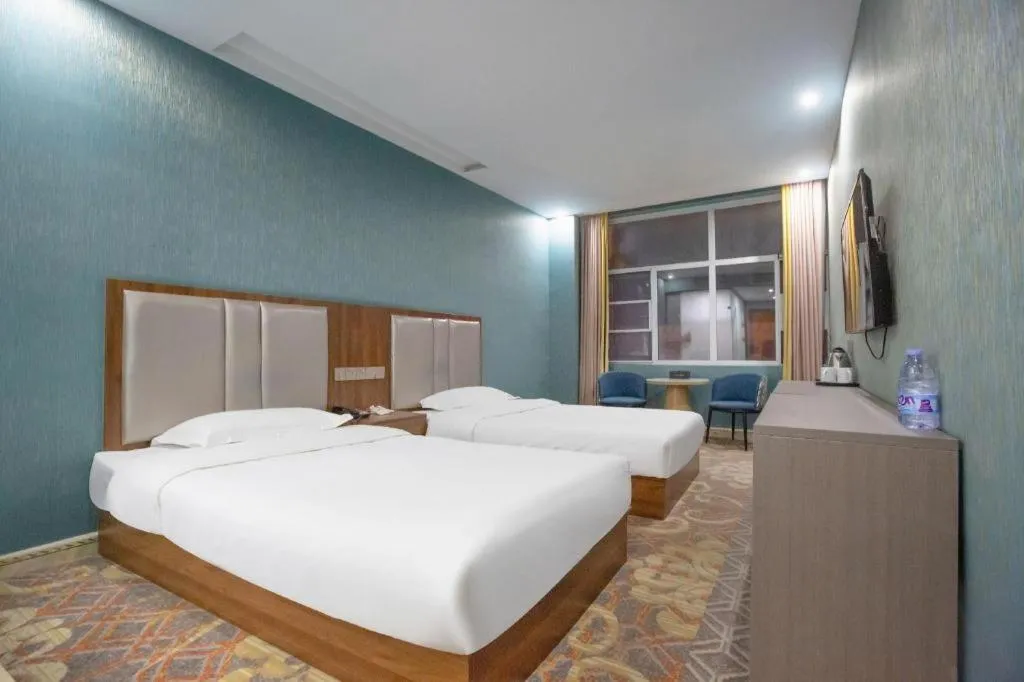 Bed in Shell Hotel Nanyang High-Speed Railway Station Jiangying Airport Huayaocheng